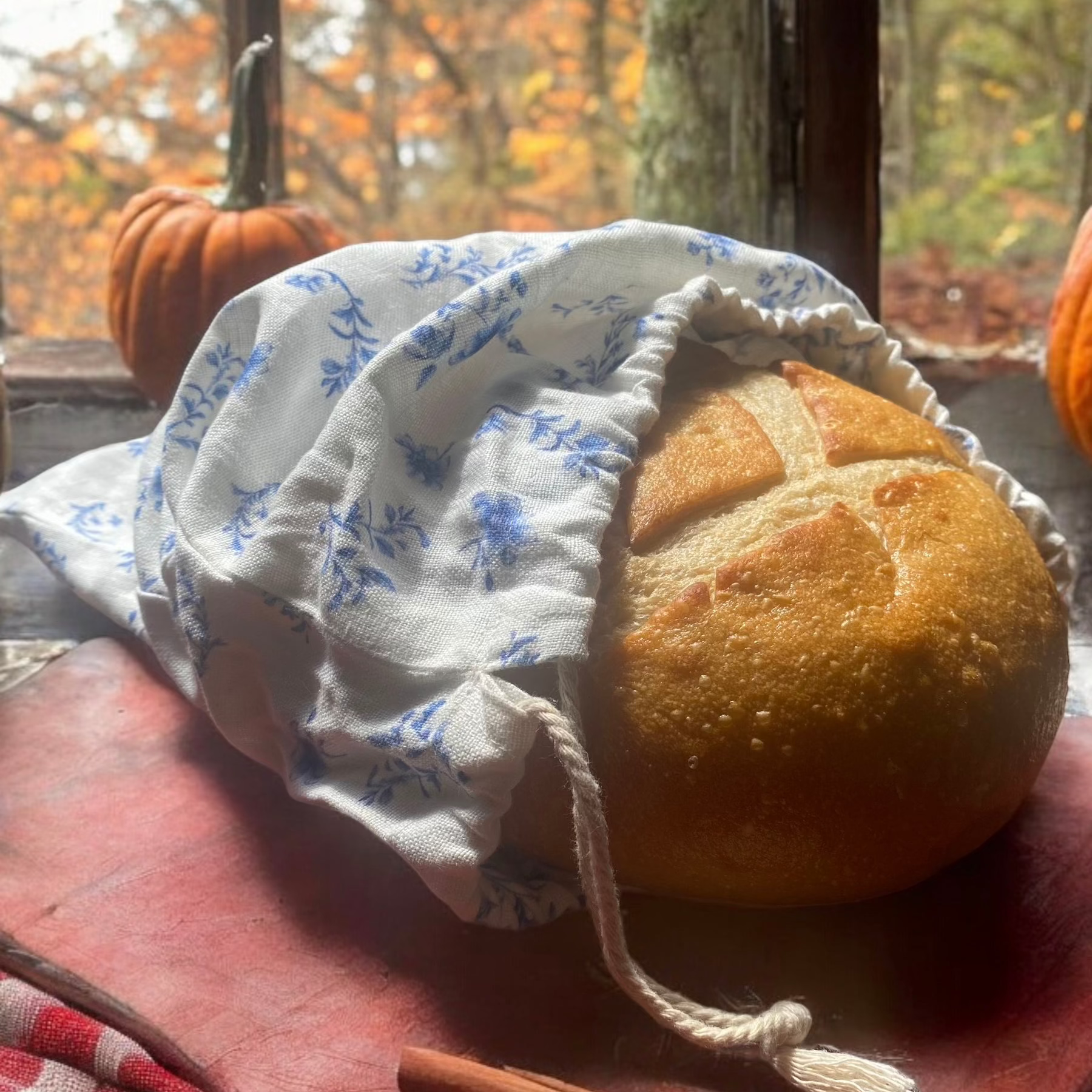 Autumn-themed floral linen French bread bag, ideal for fall decor and artisan bread storage.